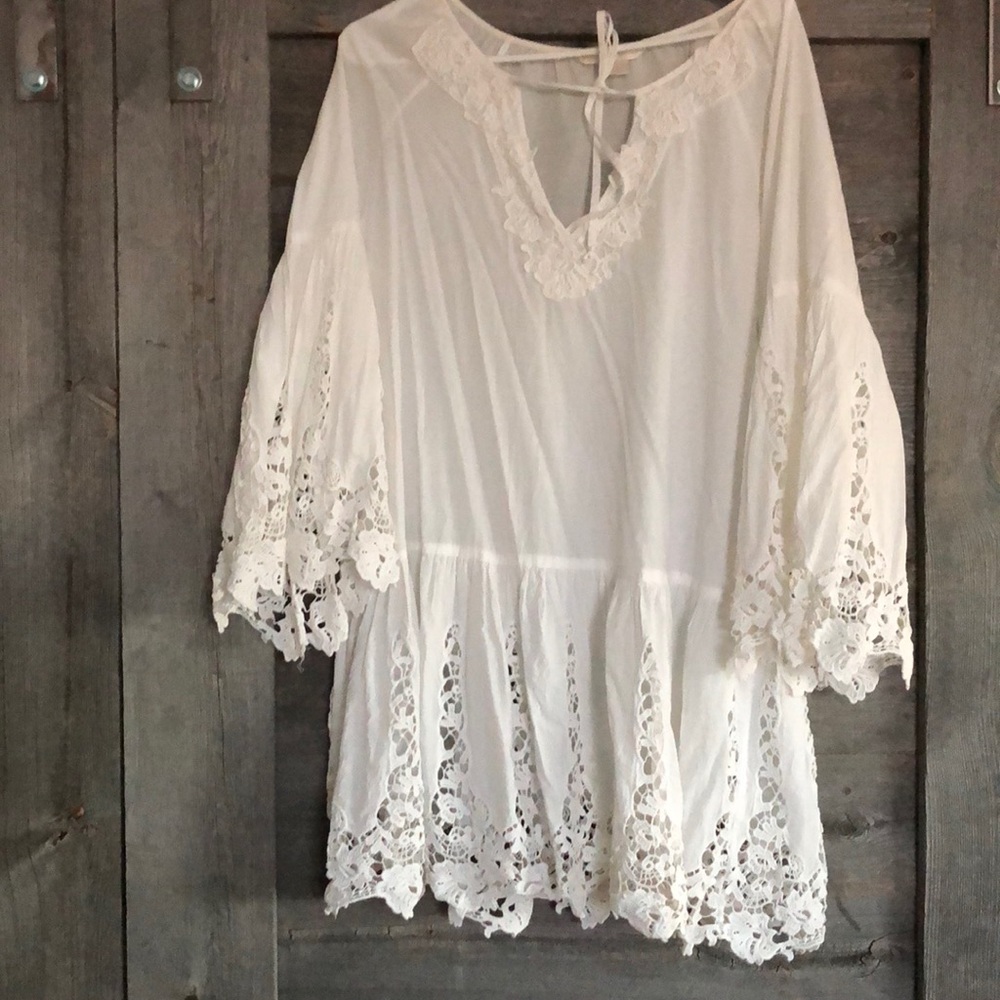 White cotton with lace swim cover up.